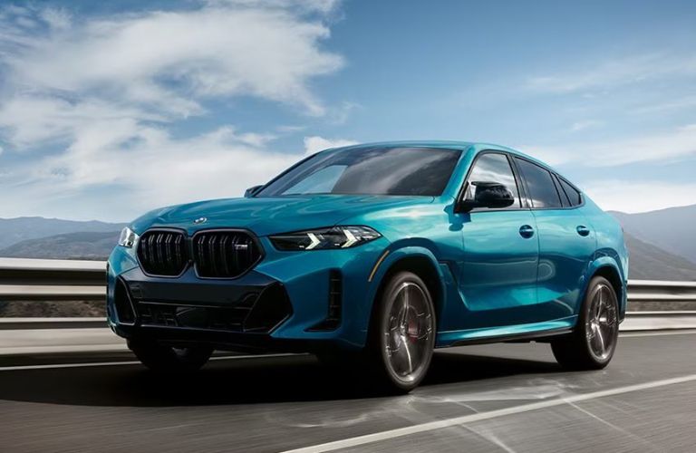 BMW X6 driving on the road