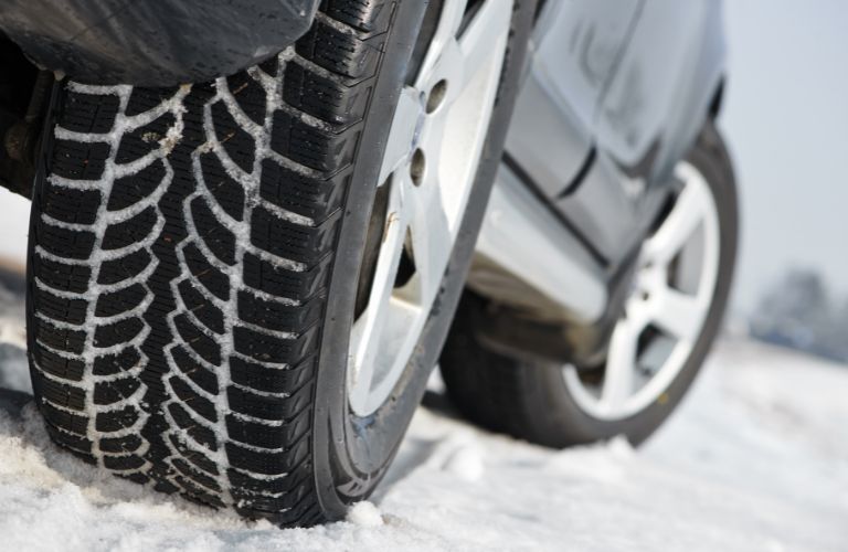 Tires of a vehicle in snow